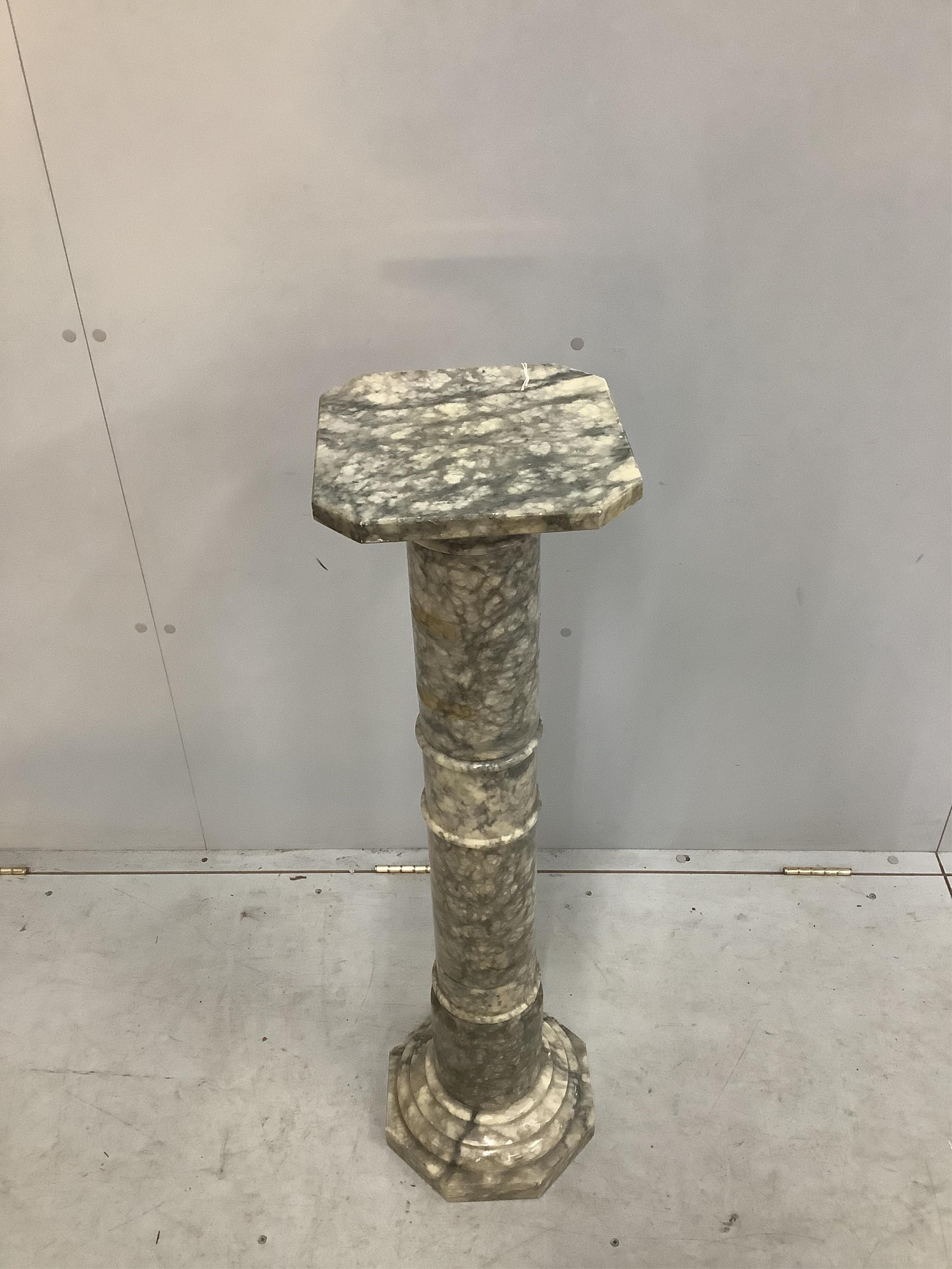 An alabaster pedestal, height 102cm. Condition - fair